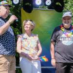Bremerton City Councilmember Michael Goodnow, left, Kitsap County Commissioner Katie Walters, and Greater Kitsap Chamber of Commerce president David Emmons kick off the Kitsap Pride Festival.