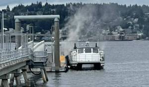 Michael Yakowenko courtesy photo
Eyewitnesses catch an image of the Admiral Pete still smoking as it arrives at the Annapolis ferry dock.