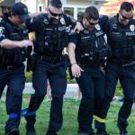 Bainbridge officers show how well they can work together during the three-legged race.