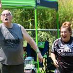 Elisha Meyer/Kitsap News Group photos
Kirk Altergott, left, makes his last throw in a game of cornhole, while Kaitie Anderson takes in her throw just a second before with a look of pleasant shock.