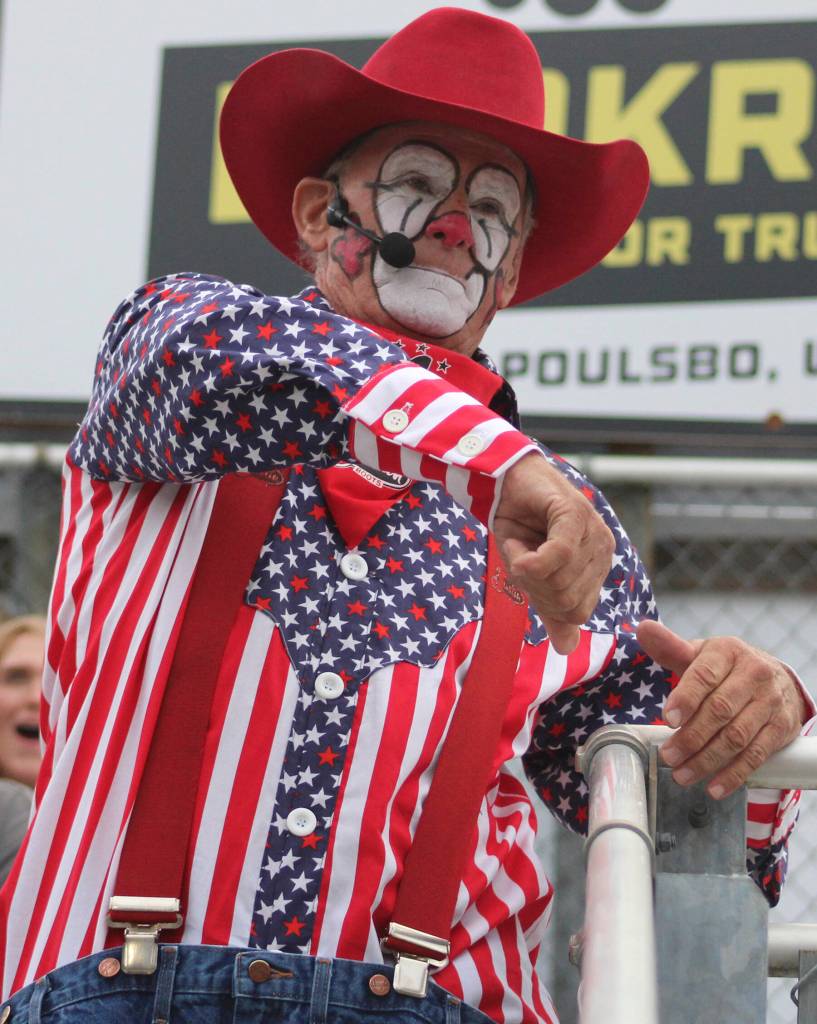 The rodeo clown makes his way into the stands, to the delight of some in the audience.