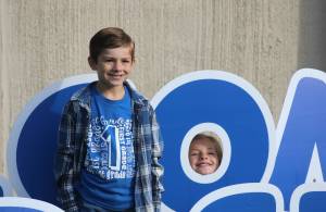Elisha Meyer/Kitsap News Group photos
Austin Seamans, left, stands up straight for his parents to take a first-day photo. Leah had another idea.