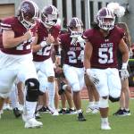 South Kitsaps football team emerges from the locker room and onto the field for the first game of the 2024 season.
