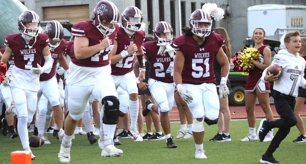 South Kitsaps football team emerges from the locker room and onto the field for the first game of the 2024 season.