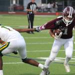 Senior wide receiver Noah Porter fights through a tackle.