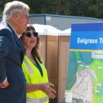 Gov. Jay Inslee learns about the eelgrass transplant pilot study being conducted at Wyckoff from Bernadette Wright.