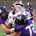 Elisha Meyer/Kitsap News Group photos
Vikings Tate Stearns, left, and Connor Nauta bring down a W.F. West ball carrier.