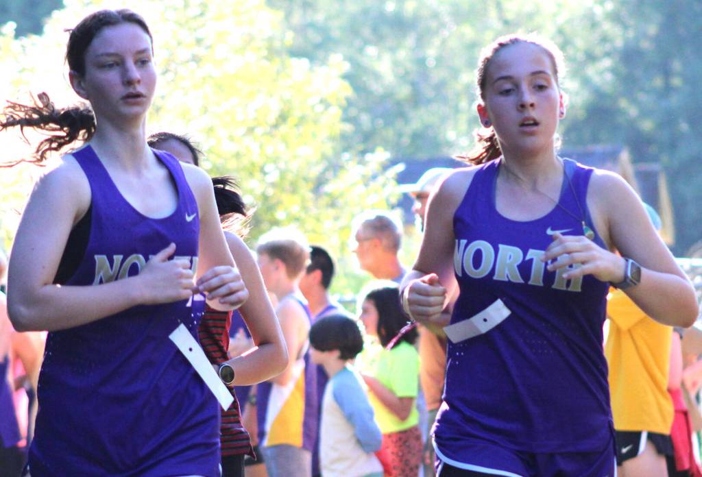 North Kitsap runners make their way downhill in the early stages of a 2-mile run.