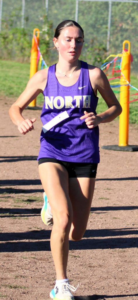 Viking junior Georgia Nelson creates some space between herself and the next pack of runners.