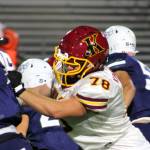 Elisha Meyer/Kitsap News Group photos
Kingston Junior offensive lineman Jack Grady tries to keep a pass rusher contained.