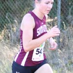 SK runner Emma Schmutz climbs a hill during the 5K race.