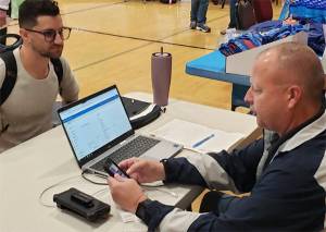 Mark Storer/Kitsap News Group photos
Navy vet Vic Dalfio receives counseling on disability resources from Todd Gruchalla, a quality assurance specialist for the VFW National Veterans Service.