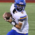 Bremerton junior Kenneth Najera reels in a pass in the first half of a game against the Olympic Trojans.