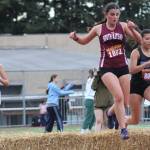 Elisha Meyer/Kitsap News Group photos
Runners in all races at the Hawks Nest Invitational came across the occasional hurdle of hay, a fun part of the speedy 3,000-meter course.