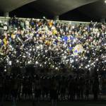 Elisha Meyer/Kitsap News Group photos
The Bainbridge High School student section helps illuminate the night in the first of two light outage delays in an Oct. 18 gave vs. North Kitsap.