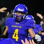 Elisha Meyer/Kitsap News Group photos
Junior Marquise Allen (No. 4) sprints into a crowd of teammates and Bremerton students to celebrate the Knights walk-off touchdown Nov. 5