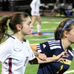 Elisha Meyer/Kitsap News Group photos
Kingston sophomore Emily Kispert and Bainbridge freshman Vega Hendrickson battle for better ground while watching the ball.