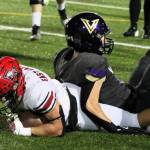 Elisha Meyer/Kitsap News Group photos
Senior Lelond Anderson helps bring down an East Valley ball carrier.