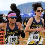Elisha Meyer/Kitsap News Group photos
Bainbridge senior Marcus Stroman, left, makes a pass around sophomore teammate Ryan Dodge in the final sprint of districts Nov. 2.