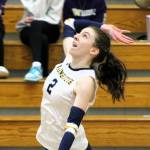 Bainbridge junior Cate Torell goes for an attack against the Washington Patriots.