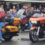 Combat veterans rev up their motorcycles while making their way through the Poulsbo parade.