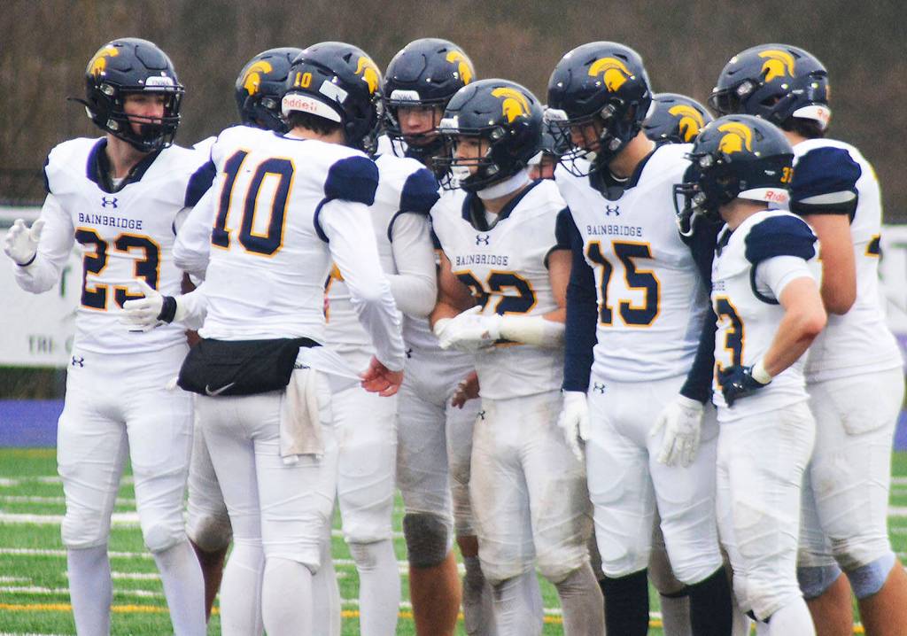 Nate Putman (10) and the Spartan offense didnt get much going against Anacortes, but the Bainbridge quarterback will be back next year as hes just a sophomore.