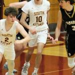 South Kitsap senior Boden Harvey takes a rebound back the other way in a second-half possession.