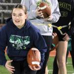 Kingston student Lily Reinbold tries to avoid a defender during an early practice flag pulling drill.