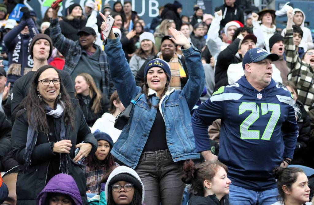 A few thousand football fans packed into the corner seats of Lumen Field to watch the 24th annual Army-Navy flag football game.