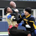 Navy defensive back Jonathon Wolfe breaks up an Army pass near the goal line.