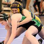 Elisha Meyer/Kitsap News Group photos
Klahowyas Kaliani Fultz works to try an escape a takedown from her opponent.