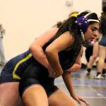 North Kitsaps Emily Gomez, right, twists out of a hold before winning against her first opponent of the night.