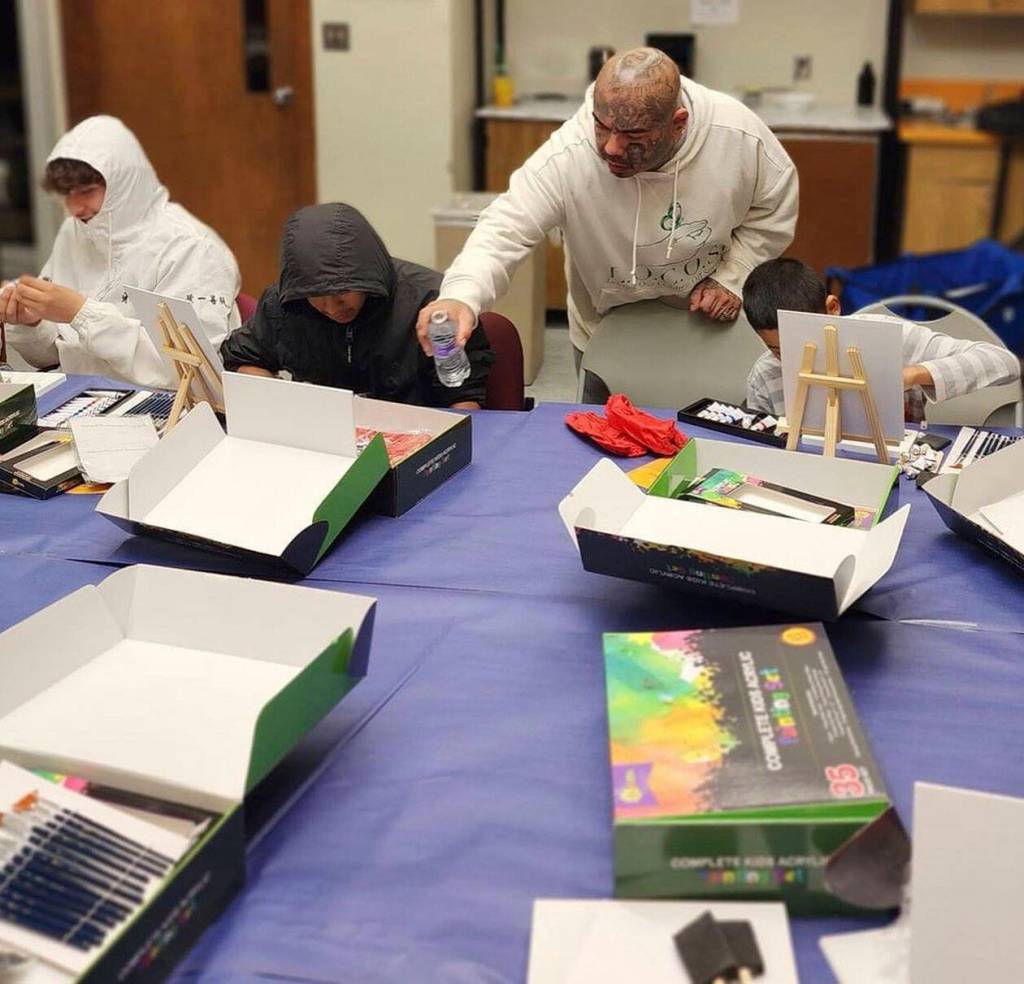 Javier Silva courtesy photos
Yakima workshop with an emphasis on statewide Politicizing Our Youth Campaign, featuring Javier Silva leading a painting session with youth.