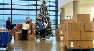 Britney Fletcher-West/Kitsap News Group photos
Volunteers stack boxes of donated toys to be given out at a local hospital.