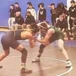 Mark Storer/Kitsap News Group photos
Omid Neghabat of Bainbridge takes on Cole Anderson of Port Angeles at the North Mason wrestling tournament.