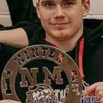 Robert Gomez courtesy photo Chris Eberlein holds the winning team trophy after being named MVP.