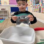 A recent science activity involved creating exploding snowmen using vinegar and baking soda to create a chemical reaction.