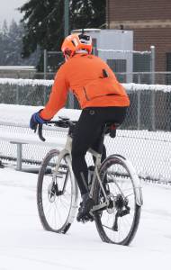 Molly Hetherwick/Kitsap News Group photos
The snow didnt keep everyone inside. Some BI residents hopped on their bikes as usual.