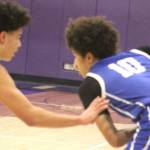 Luke Caputo/Kitsap News Group photos
Jalen Davis of Bremerton keeps the ball away from a Sequim defender in a 76-65 win against the Wolves Feb. 12 at North Kitsap High School, giving the Knights its first league title since 2014.