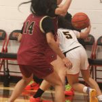 Luke Caputo/Kitsap News Group photos
Kingston Buccaneers Tati Fontes-Lawrence and Tavyn Belgarde playing tight defense against a Steilacoom Sentinel in the opening round of the 2A District 3 girls basketball tournament Feb. 15.