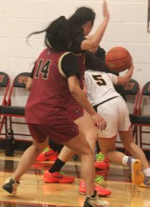 Luke Caputo/Kitsap News Group photos
Kingston Buccaneers Tati Fontes-Lawrence and Tavyn Belgarde playing tight defense against a Steilacoom Sentinel in the opening round of the 2A District 3 girls basketball tournament Feb. 15.
