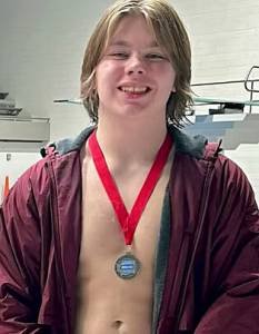 South Kitsap High School courtesy photo
SK senior diver Karter Warner wearing his 2nd place state medal.