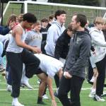 Luke Caputo/Kitsap News Group photos
Vikings assistant track coach Dustin Haydock preps his team on the first day of practice at North Kitsap High School March 3.