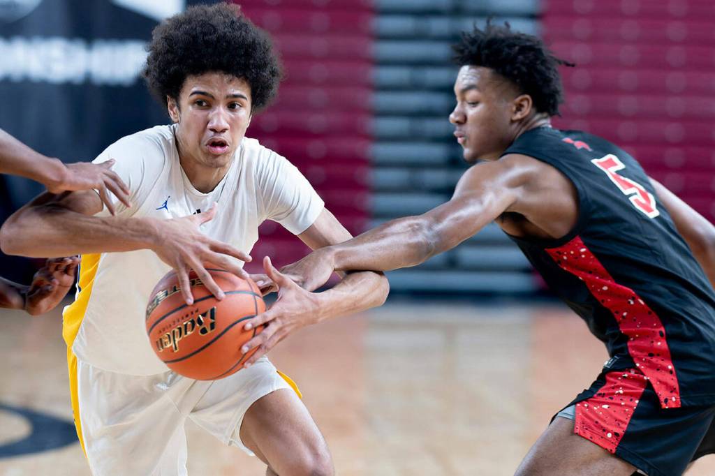 Matt Priestman courtesy photo
Bremerton sophomore Jalen Davis drives through defenders in a state quarterfinal win against Franklin Pierce in Yakima March 6.