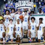 The team poses for a group photo following Bremertons first state title in boys basketball since 1974.