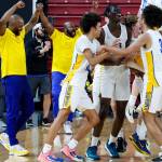 Daniel Phipps courtesy photos
Bremerton celebrates winning the 2A state boys basketball championship March 8 in Yakima.