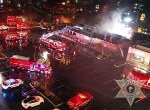 KCSO courtesy photo
Central Kitsap Fire & Rescue works to put out the fire at M&T cafe.