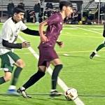 Luke Caputo/Kitsap News Group photos
SK midfielder Yuji Ehret dribbles the ball down the field in a 3-1 loss to the Evergreen Wolverines March 12 at South Kitsap High School.