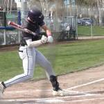 Luke Caputo/Kitsap News Group photos
Viking Spencer Gillespie swings at a pitch in a 13-6 North Kitsap win over the Olympic Trojans March 26 at the Kitsap County Fairgrounds.