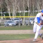 Trojan Chase Beninger delivers a pitch in an Olympic loss to North Kitsap March 26.